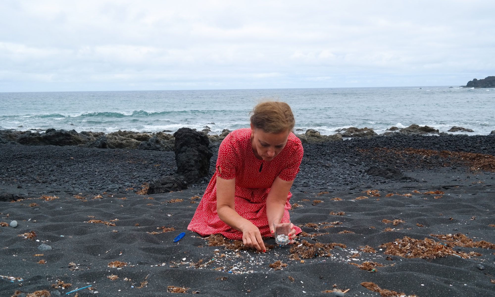 Artist Swaantje Güntzel clears a squaremeter of beach of microplastics in Lanzarote (Spain). During her intervention, she counted 1370 pieces. Image: Jan Philip Scheibe